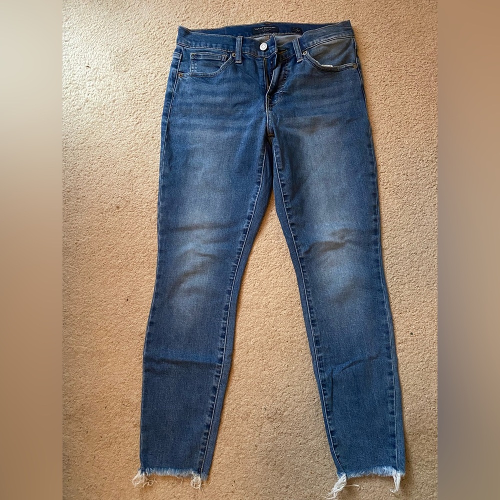 Denim jeans, never worn.